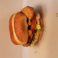 Classic Chicken Sandwich · Crispy chicken breast served with lettuce, tomato, pickle and mayo on a brioche bun
