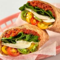 Roasted Tomato Caprese Wrap (Vegetarian) · Fresh sliced mozzarella, baby spinach, cherry tomatoes and sundried tomato pesto spread in a...
