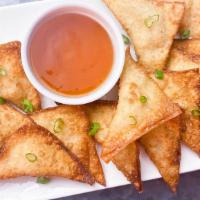 Crab Cream Cheese · Crispy wonton skin filled with cream cheese and imitation crabmeat. 