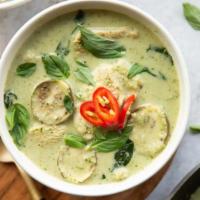 Green Curry · Green curry paste and coconut milk with eggplant, bell pepper and fresh Thai basil. 