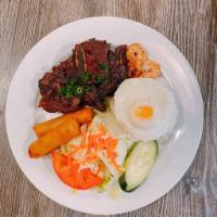 33. Grilled Beef Short Ribs Combo · Com Suon dai han nuong dac biet. Serve with side salad, pickles, sunny side fried egg, eggro...