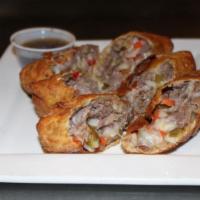 Italian Beef Egg Rolls · Italian beef, mozzarella, and mild giardiniera.