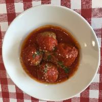 Meatballs · 4 of our famous homemade meatballs simmered in our tomato sauce.
