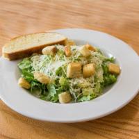 Caesar Salad · Fresh, crisp romaine, lettuce tossed with our Caesar salad dressing and croutons, topped wit...