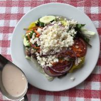 Greek Salad · Fresh lettuce blend, red onions, cucumbers, tomatoes, carrots, olives, pepperoncini peppers ...