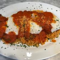 Eggplant Parmigiana Dinner · Fried eggplant topped with tomato sauce, mozzarella and parmesan cheeses, then baked in the ...