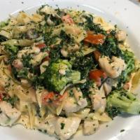 Fettucini Primavera Dinner · Fresh broccoli, spinach, artichokes hearts and mushrooms sauteed in a light, creamy rose sau...