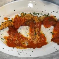 Chicken Parmigiana Dinner · Breaded and golden fried chicken breast topped with melted mozzarella cheese and tomato sauc...