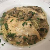 Chicken Marsala Dinner · Sauteed chicken breast and fresh mushrooms in a sweet Marsala wine reduction served on a bed...