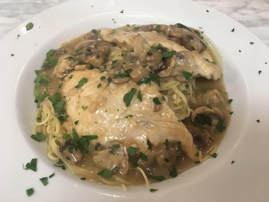 Chicken Marsala Dinner · Sauteed chicken breast and fresh mushrooms in a sweet Marsala wine reduction served on a bed of capellini pasta.