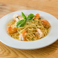 Shrimp Scampi Dinner · Gulf shrimp seared with a white wine, garlic and lemon sauce, tossed with linguini pasta.