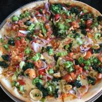 Gourmet Veggie Pizza · Broccoli, spinach, fresh tomatoes, red onions, peppers and mushrooms with your choice of red...