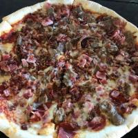 Meat Lovers Pizza · Pepperoni, ham, ground beef, bacon and sausage.