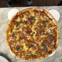 BBQ Chicken Pizza · Smoked Gouda, mozzarella, BBQ chicken, red onions and cilantro.