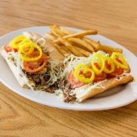 Spicy Hot Mamma Cheesesteak Sub · Chopped ribeye steak, jalapeno peppers and provolone cheese, topped with lettuce, tomato, ba...