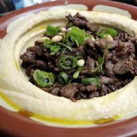 Hummus with Meat · Hummus with chicken or beef shawarma, chicken or kufta kebab, chicken chops or lamb kebab.
