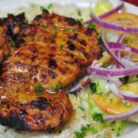 Chicken Chops Entree · 2 pieces of boneless chicken thighs charbroiled, marinated and seasoned. Served with 2 sides.