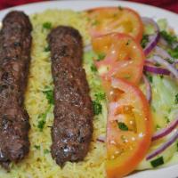 Beef Kofta Kebab Entree · 2 skewers of kofta kebab, charbroiled, marinated and seasoned. Served with 2 sides.