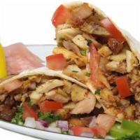 Chicken Shawarma Sandwich · Grilled slices of seasoned and marinated chicken.