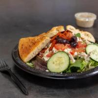 Mediterranean Chicken Salad · Mixed greens, grilled chicken breast, feta cheese, Roma tomatoes, cucumbers, Kalamata olives...