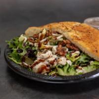 Walnut and Green Apple Salad · Mixed greens, grilled chicken breast, bleu cheese crumbles, green apples, candied walnuts, c...