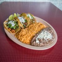Mexican Tacos Combo · Mexican style. Cilantro y cebolla. 3 tacos con una orden de arroz y frijoles. Cilantro and o...