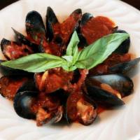 Sal’s Famous Mussels  · Prince Edward Island mussels, roasted tomatoes, and fresh basil with light creamy marinara s...