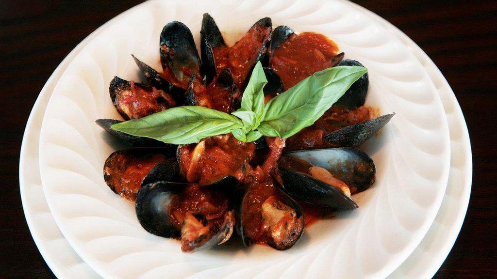 Sal’s Famous Mussels  · Prince Edward Island mussels, roasted tomatoes, and fresh basil with light creamy marinara sauce on a bed of linguine. Served with choice of soup or salad and 2 garlic rolls. Add proteins for an additional charge.