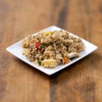 Pineapple Fried Rice · Stir-fried rice with pineapples, onion, scallion, tomatoes, cashew nuts, carrot, fried garli...