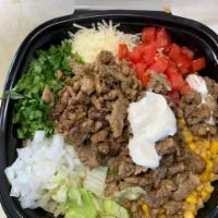 Burrito Bowl · Your choice of meat on a bed of rice and beans, topped with lettuce. tomato, cilantro, onion...