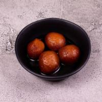 Gulab Jamun · Juicy deep fried cheese ball dipped in syrup.