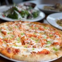 Buffalo Chicken Pizza · Mozzarella cheese, crumbled blue cheese, green onions, fried chicken tossed in Buffalo sauce...