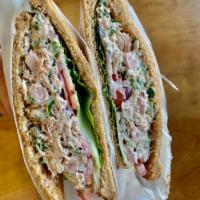 Herb Tuna Sandwich · Wheat bread, lettuce, red onion, tomato.