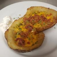 Jumbo Potato Skins · Just that! 2 extra large skins with real cheddar cheese and real bacon and a bit of chive, s...