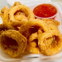 Calamari · Crispy Calamari rings with just the right kick! Serve with sweet chili sauce on the side.