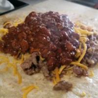Texas Ranger Burrito · Refried beans, rice, choice of meat (steak, chicken or pork), onion, cilantro, sour cream, c...