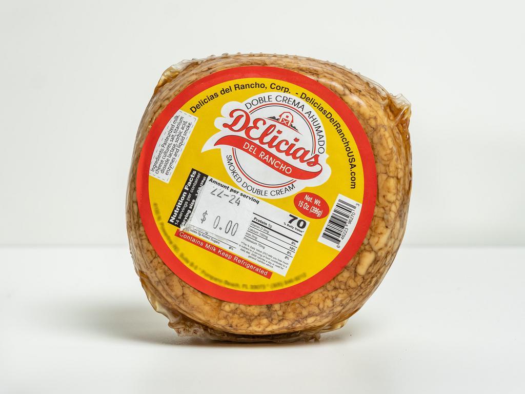 Queso Doble Crema Ahumado  · Este delicioso queso funciona perfecto para freir y hacer una riquisima repocheta.
