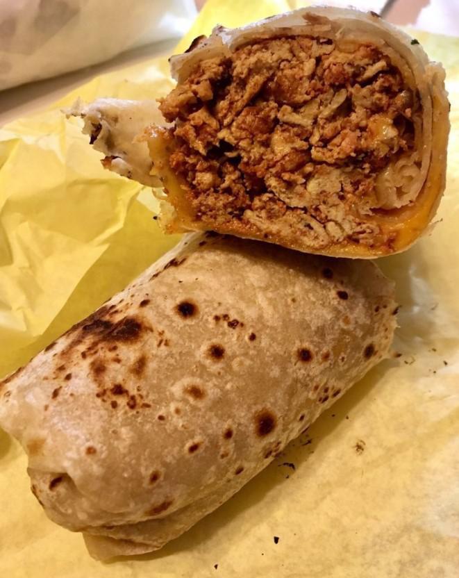 Carne Asada Burrito · Guacamole and pico de gallo.