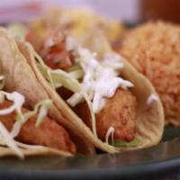 * 2 - Two Fish Tacos + Rice ＆ Beans · Beer batter fish, cabbage, salsa fresca, house sauce, rice and beans. Includes  drink. Inclu...
