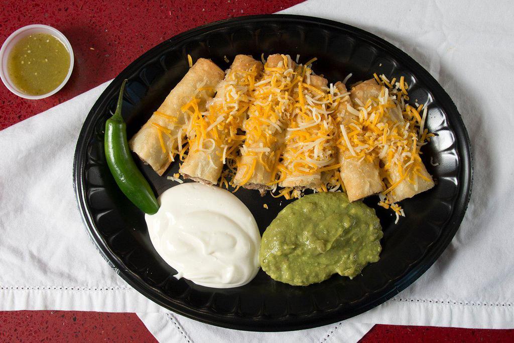 * 7 - Three Flautas + Rice ＆ Beans · Sour cream, guacamole, and cheese. Served with rice and beans. Includes drink.