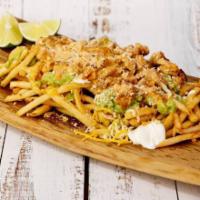 * Grilled Chicken Fries · Grilled Chicken, cheese, guacamole and sour cream.