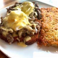Bulgogi Benedict · Poached Eggs, Marinated Steak, Hollandaise, on Texas Toast, with Hash browns
