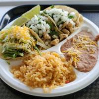 Taco Box · 3 Tacos of your choice. Served with a side of rice and beans.
