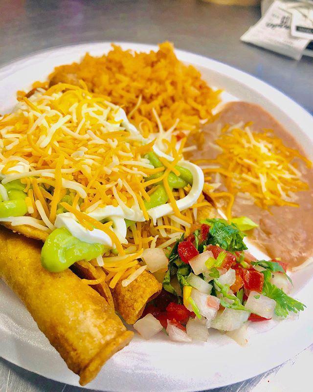 Rolled Taco Combo · 4 deep fried rolled tacos served with beans and rice. Topped with lettuce, sour cream, guacamole, shredded cheese and pico de gallo.