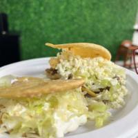 Gordita  · Homemade fried masa , filled with refried beans, your choice of meat, lettuce, sour cream an...