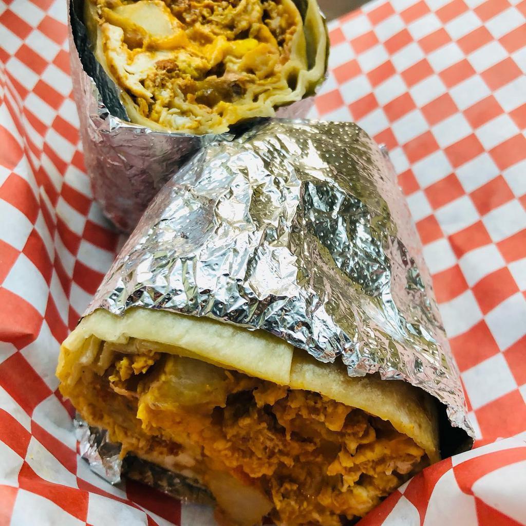 Breakfast Burrito · All breakfast burritos are made with your choice of meat, 4 eggs, potatoes and shredded cheese. 
