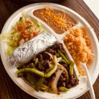 Fajita Combination Plate · Steak cooked with bell pepper & onions. Served with a side of rice, beans, lettuce,pico de g...