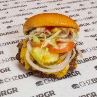 Chzburgr · Green leaf lettuce, tomato, pickles, shaved onions and chzburger sauce.