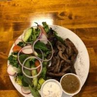 Gyro Plate · Spiced lamb and beef with tahini sauce.