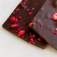 Dark Chocolate Raspberry Bark · Dark chocolate with 70% cocoa and freeze dried raspberries.  The tangy raspberries counterpo...